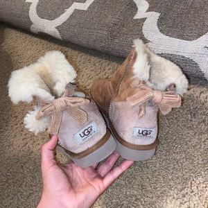 UGGS with suede bows on the back